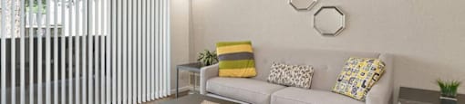 a living room with a couch and a table
