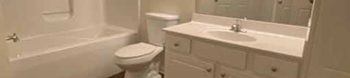 Large Bathroom with tub and vanity space at brickyard apartments