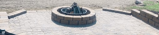 Firepit and pond area at brickyard apartments