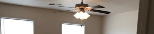 Large bedroom with lots of lighting at the brickyard apartments