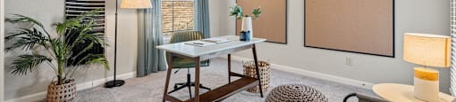the preserve at ballantyne commons living room with windows and a desk