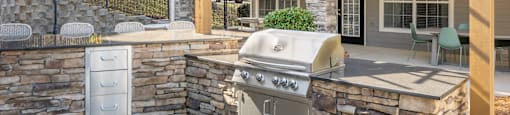An outdoor grilling pavilion at 1322 North Apartments in Auburn, AL.