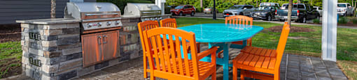 Apartments for Rent in Myrtle Beach SC - Lattitude @ The Commons - Outdoor Grill Area Shaded by a Pergola