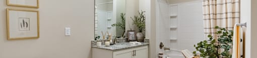 Spacious Bathroom with a Sink, Bathtub and Toilet.