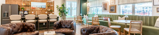 Interior of Clubhouse with Multiple Sitting Areas to Gather or Eat.