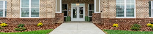 Outside of the Clubhouse with Two Front Doors.