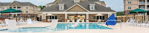Building in the Background with Pool in Front of it.