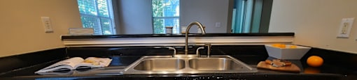 kitchen with white cabinets and new countertops