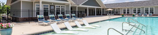 our apartments have a large resort style pool with lounge chairs