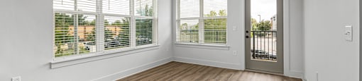 Altitude Raleigh apartment open layout living room with large windows