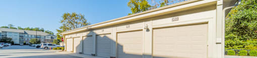 the garage at the end of the driveway of a parking lot