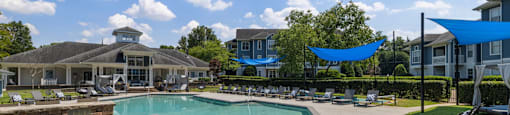 our apartments offer a swimming pool with chairs and umbrellas