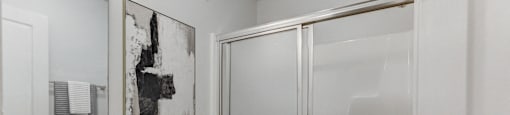 Apartment home bathroom with shower and sink