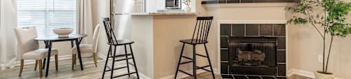 the preserve at ballantyne commons living room and dining room with fireplace