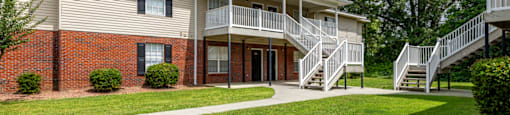 our apartments offer a spacious yard and stairs to the apartments for rent
