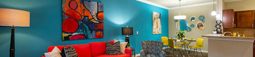 Myrtle Beach SC Apartments - Lattitude @ The Commons - Spacious Living Room with a Ceiling fan and Woodstyle Flooring