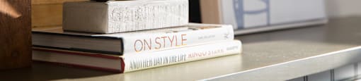 A book and decorations at 27Seventy Lower Heights apartments in Houston, TX.