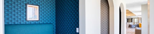 Built in booth style seating and tables in clubhouse at 27Seventy Lower Heights apartments in Houston, TX.