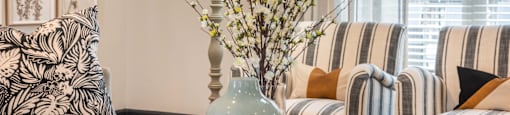 detail shot of living space with greenery and coastal furniture