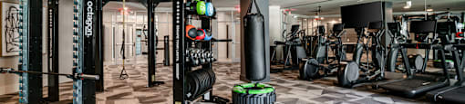 the gym at the has weights machines and other workout equipment