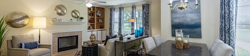a living room with a couch and a table