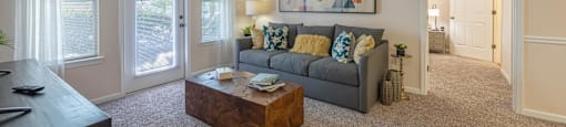 a living room with a couch and a coffee table
