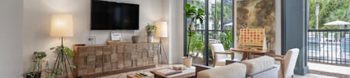 a living room with a couch and a tv