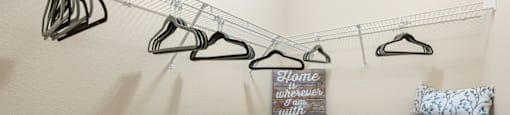 our spacious closets are stocked with shoes and bags at our apartments in the village