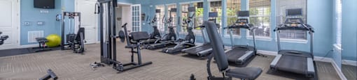 the gym at the preserve at polo ridge apartments