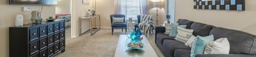 a living room with a couch and a coffee table
