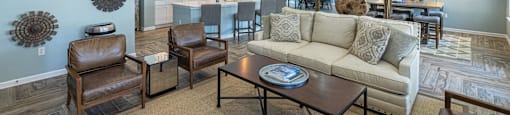 a living room with a couch and a table