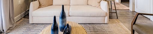 a living room with a couch and a table