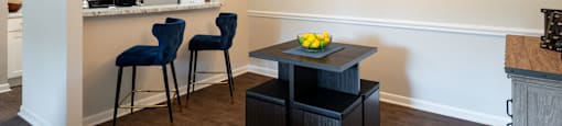 a kitchen and dining area in a 555 waverly unit
