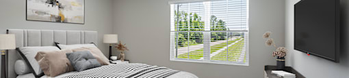 an empty bedroom with a bed and a window