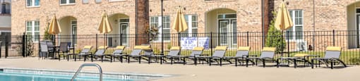 our apartments have a large pool and lounge chairs