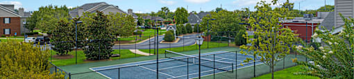 an aerial view of the tennis courts at the estates at spring valley