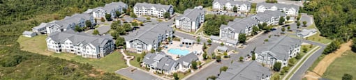 an aerial view of a group of houses in a residential area