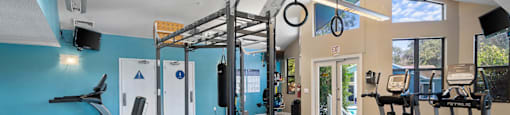 the gym at the flats at big tex apartments
