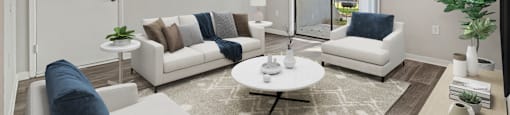 a living room with couches and a coffee table