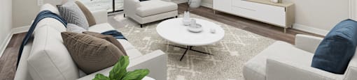 a living room with couches and a coffee table