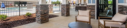 A patio with a table and chairs is shown.