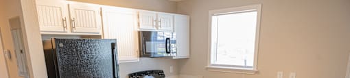 Spacious kitchen in your new home at Deerbrook Apartments in Wilmington, NC 28405