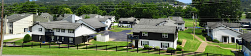 a view of the subdivision from the road