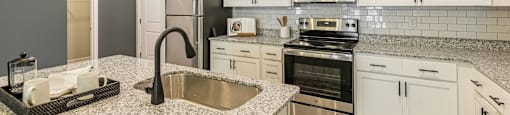 Granite countertops with stainless steel appliances