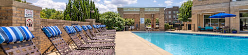 our apartments offer a swimming pool with chaise lounge chairs