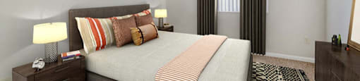 Spacious bedroom with plush carpeting and large window at Midora at Woodmont in Tamarac, FL