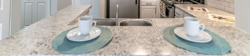Kitchen at Mission Club Apartments in Orlando, FL