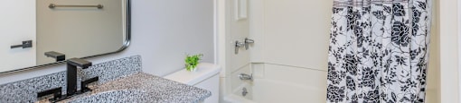 large bathroom with shower and tub combo