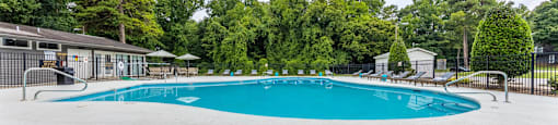 the swimming pool at woodland park apartments