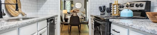 a kitchen with white cabinets and black appliances and a dining room with a table